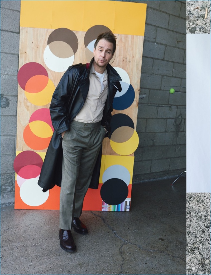 Sam Rockwell wears a Marni trench and Editions M.R shirt. He also sports a Simon Miller t-shirt, Huntsman pants, Rolex watch, and Church’s shoes.