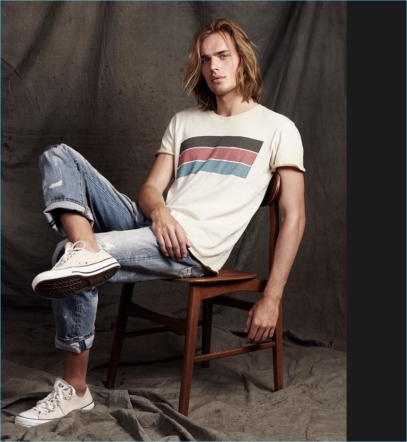 Embracing a relaxed look, Ton Heukels sports a washed t-shirt.