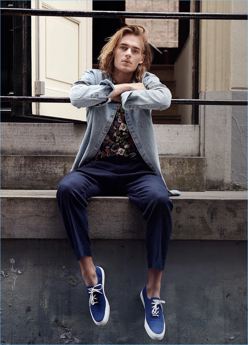 Making a case for prints, Ton Heukels wears a Souvenir printed Hawaii shirt with indigo pleated trousers.