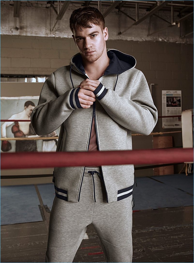 Matty Carrington wears a sweatshirt and joggers from I.FIV5.