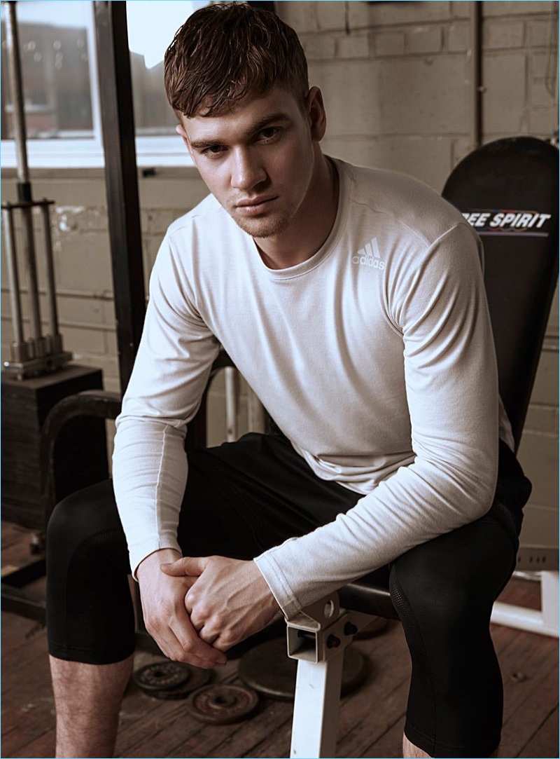 Model Matty Carrington wears an Adidas long-sleeve tee and capri joggers. » Spring 2018 Men’s Activewear Trends Model Matty Carrington wears an Adidas long-sleeve tee and capri joggers.
