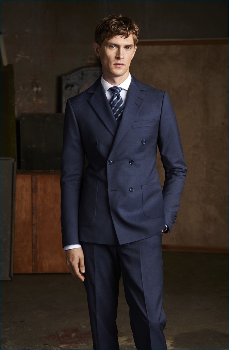 Donning a sharp suit, Mathias Lauridsen fronts Tiger of Sweden's spring-summer 2018 campaign.