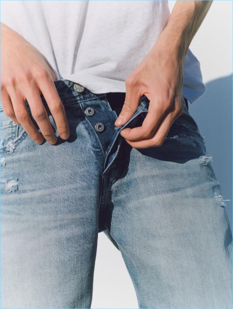 A detailed buttoned fly shot appears as part of AG Jeans' spring-summer 2018 campaign.