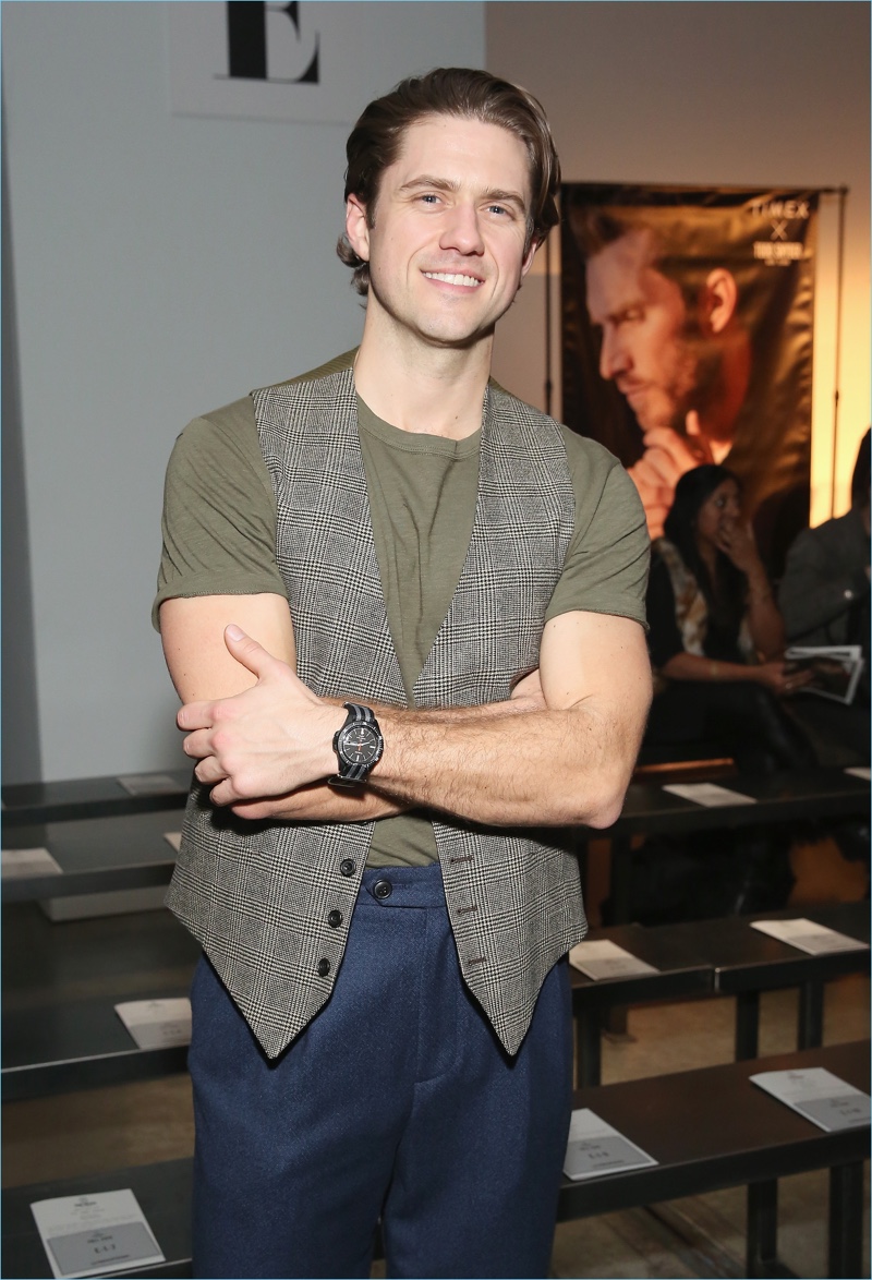 Aaron Tveit sports the Todd Snyder x Timex MS1 Maritime sport watch.