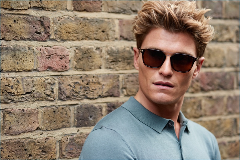 Sporting sunglasses, Oliver Cheshire stars in Marks & Spencer's spring-summer 2018 Autograph campaign.