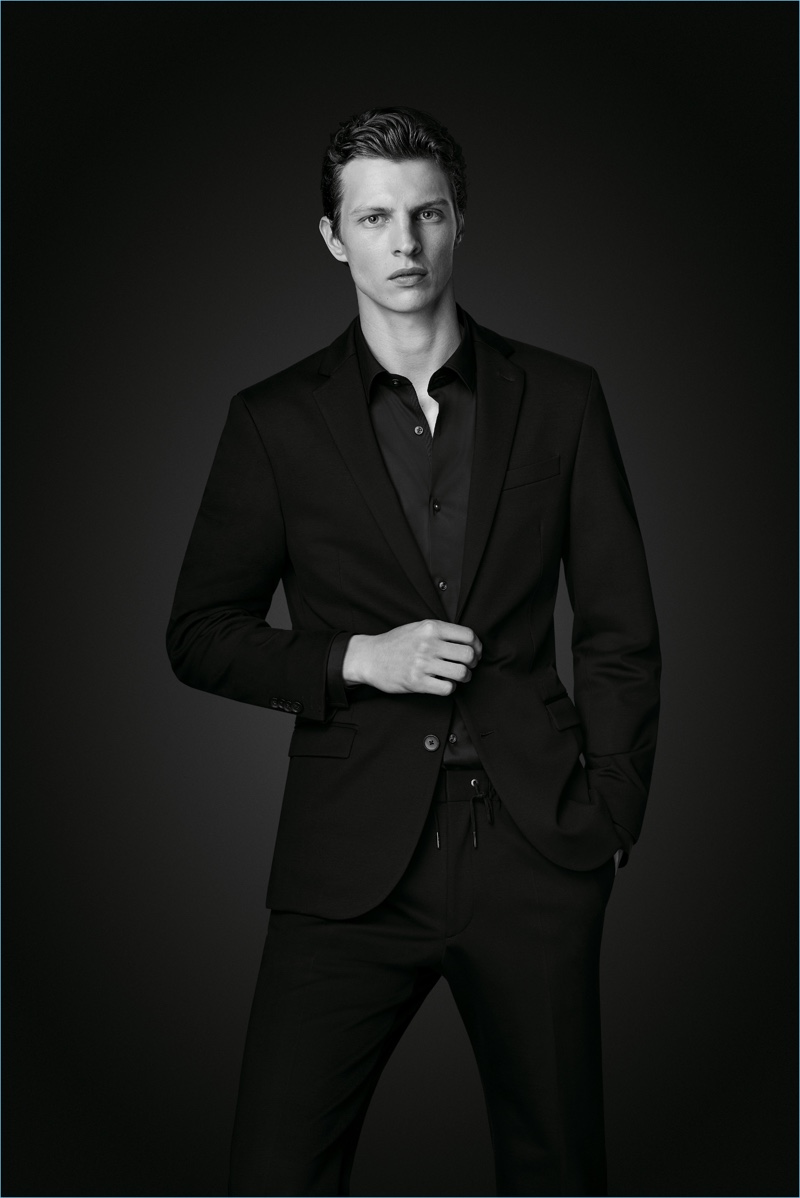 Suiting up, Tim Schuhmacher wears a look from BOSS' Black Edition capsule collection. » BOSS Revisits Modern Wardrobe with Black Edition Capsule Suiting up, Tim Schuhmacher wears a look from BOSS' Black Edition capsule collection.