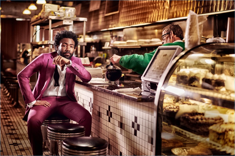 Stopping by a diner, Donald Glover wears a look by Calvin Klein.