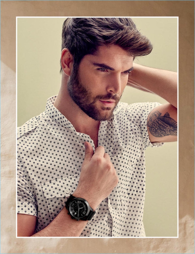 Guess enlists Nick Bateman as the star of its spring-summer 2018 accessories campaign.