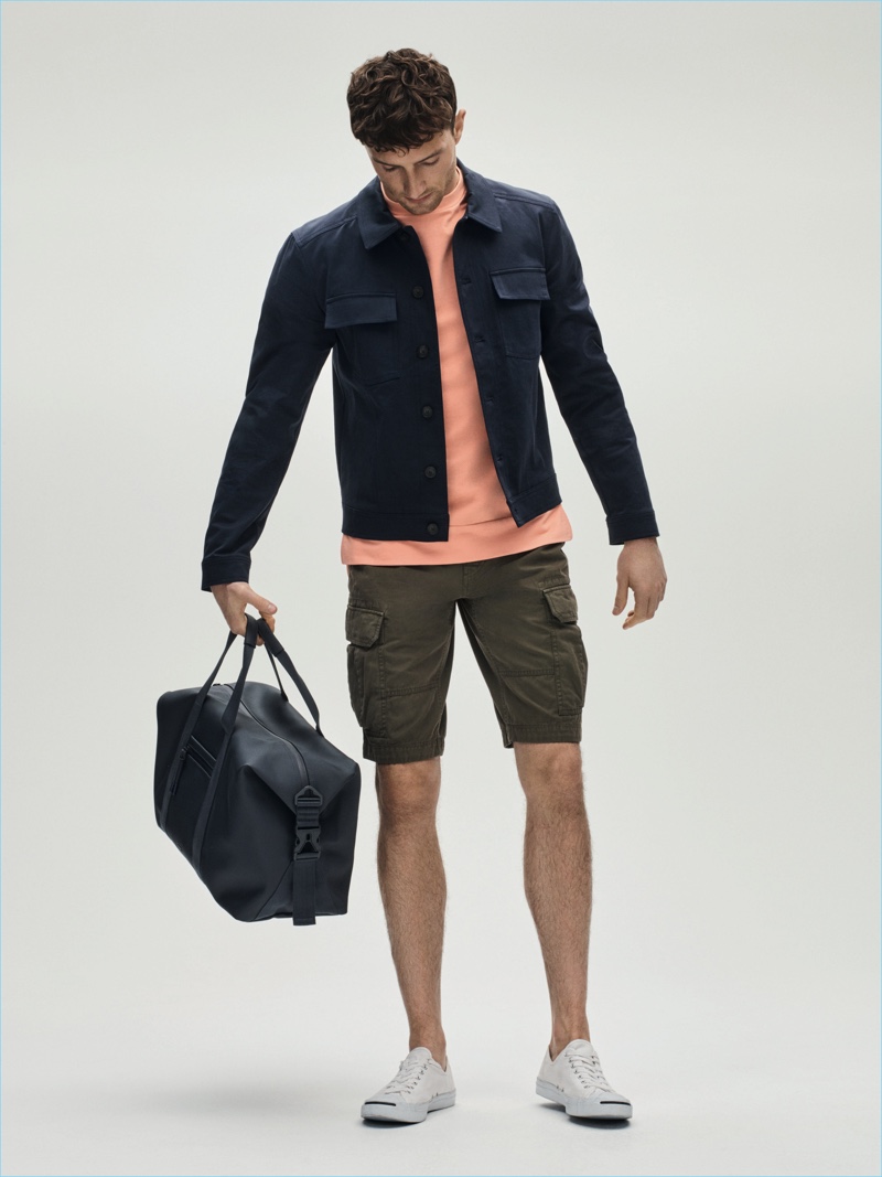 Jacket £150 Libertine Top £25 Shorts £40 both Criminal Holdall £140 Lacoste at House of Fraser