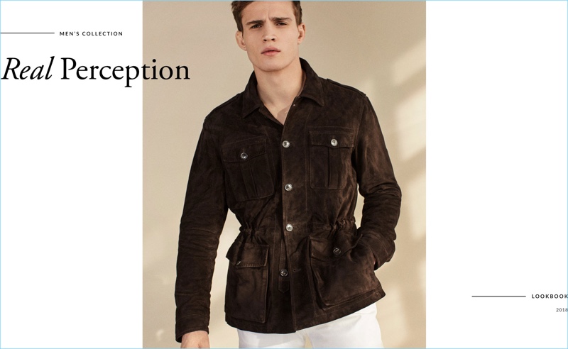 Julian Schneyder dons a suede field jacket in brown by Massimo Dutti.