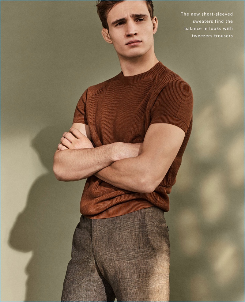 Model Julian Schneyder dons a short-sleeve sweater from Massimo Dutti.