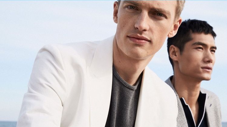 Models Victor Nylander and Hao Yun Xiang star in an editorial for Massimo Dutti.