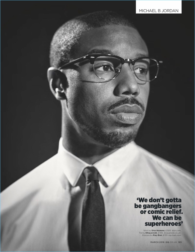 Connecting with British GQ, Michael B. Jordan wears a Dior Homme shirt, Dsquared2 tie, and Ray-Ban glasses.