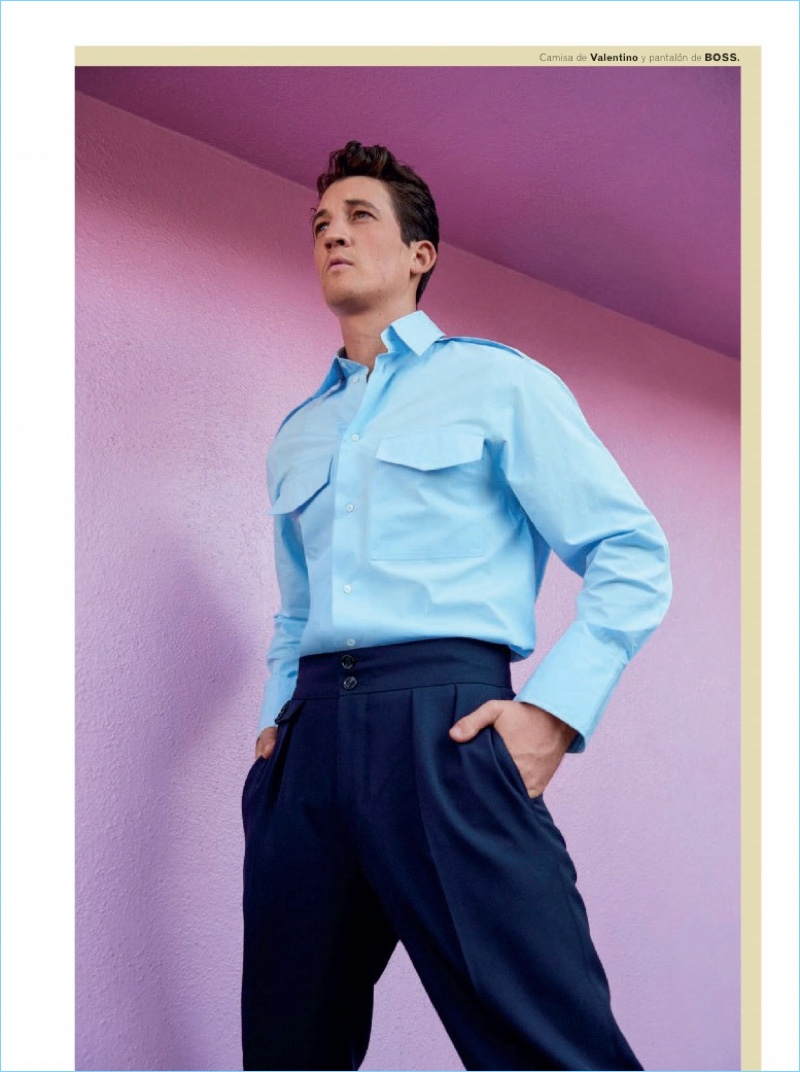 Appearing in a photo shoot for Esquire España, Miles Teller wears a Valentino shirt with BOSS pants.