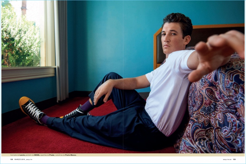 Linking up with Esquire España, Miles Teller sports a Lanvin shirt with BOSS pants. Teller also wears Prada shoes.
