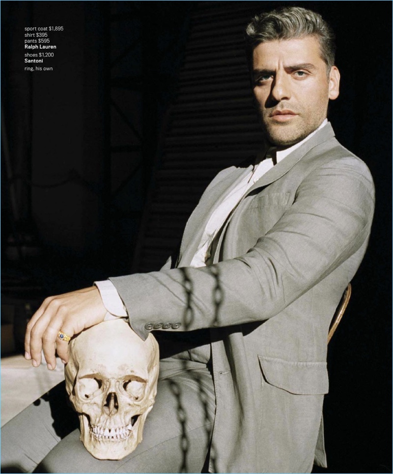 An elegant vision, Oscar Isaac wears a Ralph Lauren look with Santoni shoes.