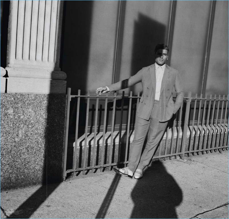 Dressed to impress, Oscar Isaac wears a Ralph Lauren look with Santoni shoes.