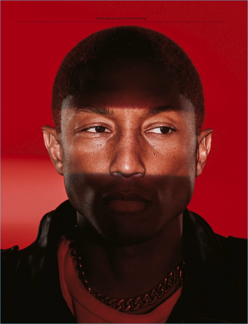 Music artist Pharrell wears Human Made.