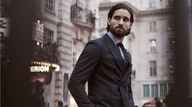 The Art of Fine Tailoring: Jamie Jewitt Inspires in Reiss Jamie Jewitt is dressed to impress with a Reiss pinstripe double-breasted blazer and trousers. He also wears a houndstooth check shirt and polka dot tie.