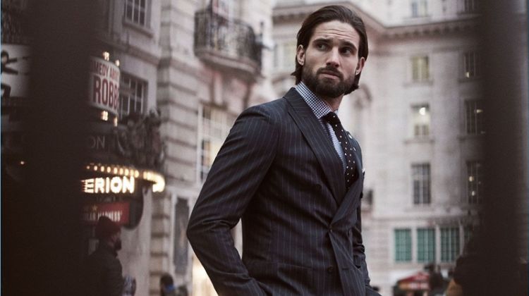 Jamie Jewitt is dressed to impress with a Reiss pinstripe double-breasted blazer and trousers. He also wears a houndstooth check shirt and polka dot tie.