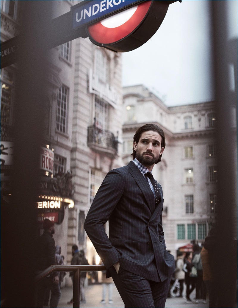 Jamie Jewitt is dressed to impress with a Reiss pinstripe double-breasted blazer and trousers. He also wears a houndstooth check shirt and polka dot tie.