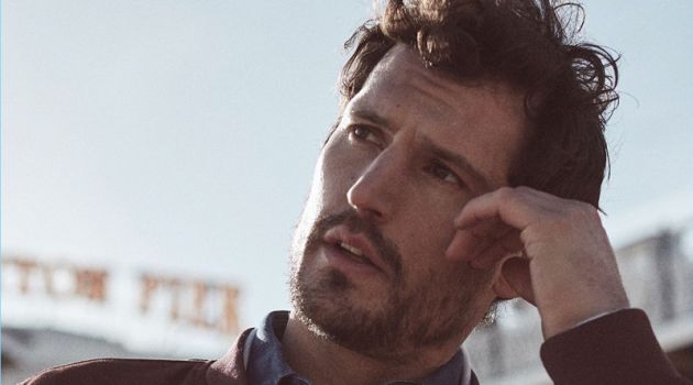 Dressing with Depth: Sam Webb Dons Reiss Spring Styles Connecting with Reiss for spring, Sam Webb wears a suede bomber jacket, denim shirt, and knit blazer.
