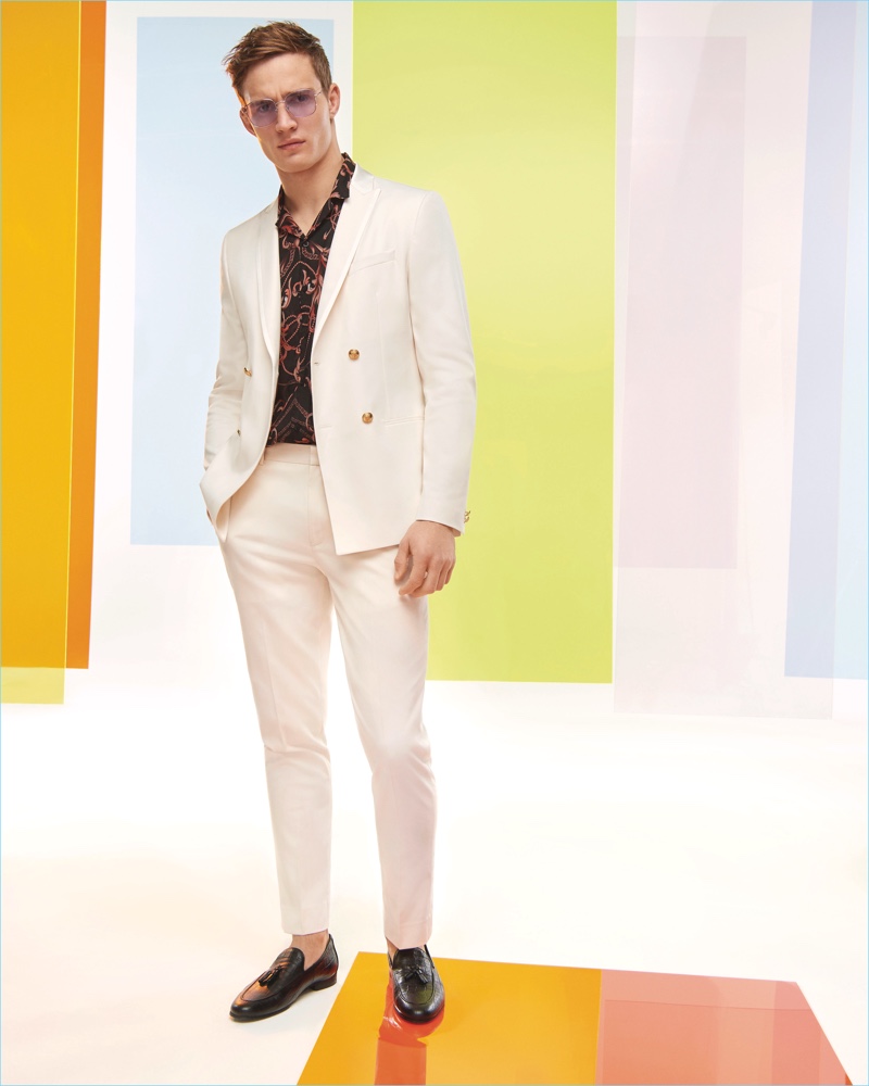 Suiting up for summer, Julian Schneyder connects with River Island.