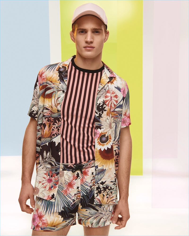 Embracing prints, Julian Schneyder reunites with River Island to model its high summer collection.