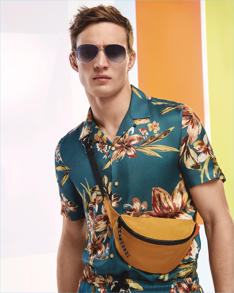 Julian Schneyder wears a Hawaiian print shirt from River Island's high summer collection.