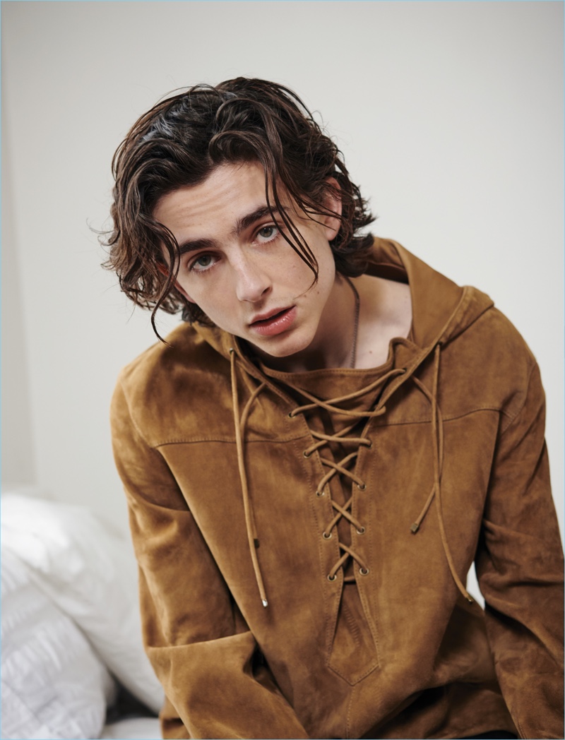 Connecting with VMAN, Timothée Chalamet wears a suede Saint Laurent top.