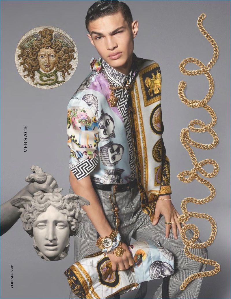 Noah Luis Brown sports one of Versace's opulent printed shirts for the brand's spring-summer 2018 campaign.