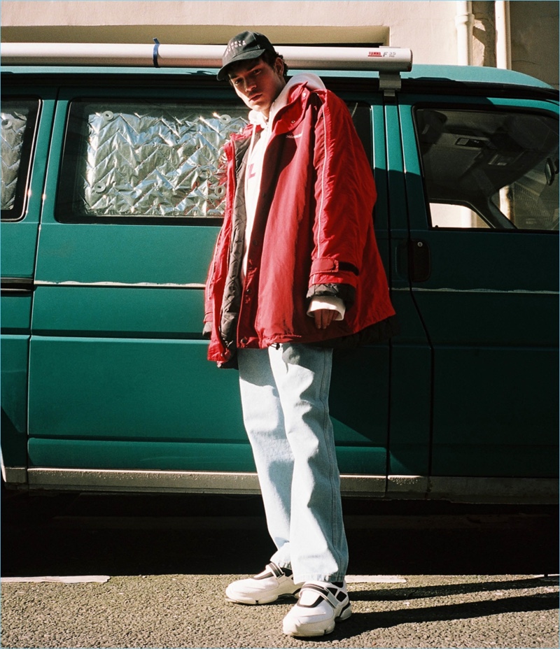 Connecting with Barneys, Luka Isaac wears a Balenciaga parka, Helmut Lang hoodie, Gosha Rubchinskiy jeans, and Prada sneakers.