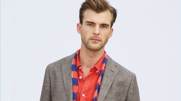 Embracing Beymen Collection's latest styles, Patrick Kafka accessorizes with a scarf.