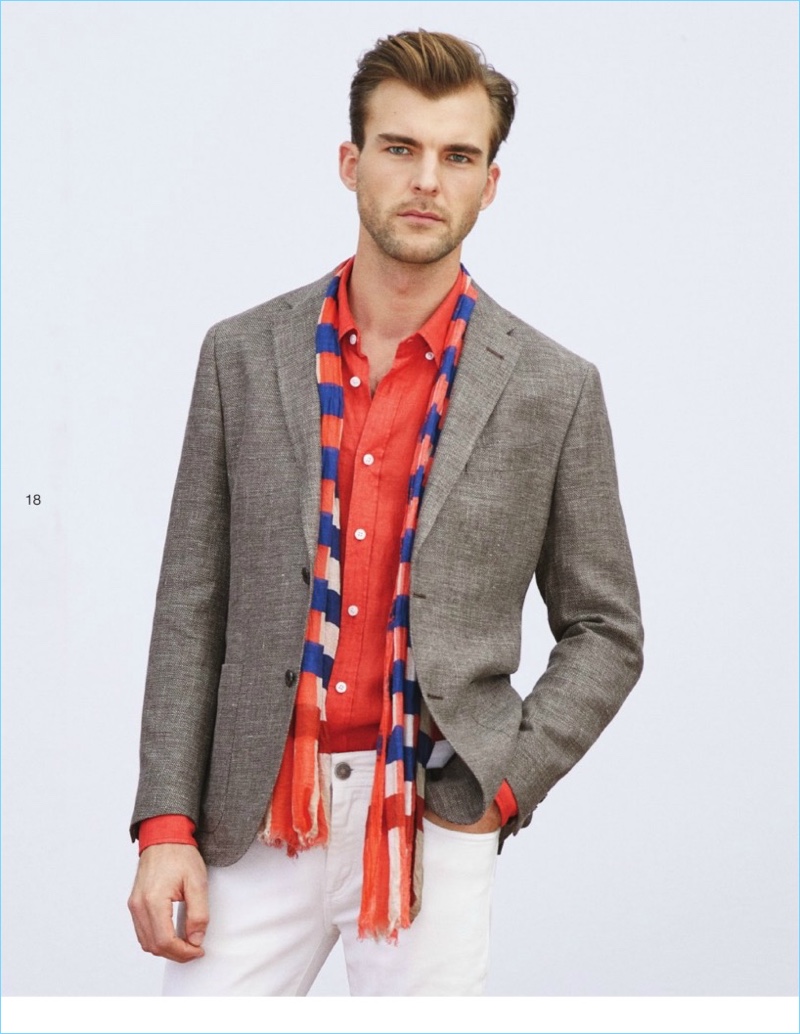 Embracing Beymen Collection's latest styles, Patrick Kafka accessorizes with a scarf.