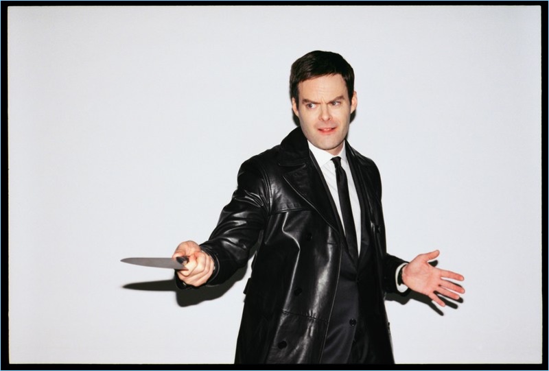 Dabbling in a little knife play, Bill Hader wears a leather coat by Off-White.