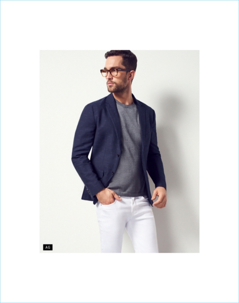 White Out: Wearing AG denim, Tobias Sorensen pairs white jeans with a smart sport coat.