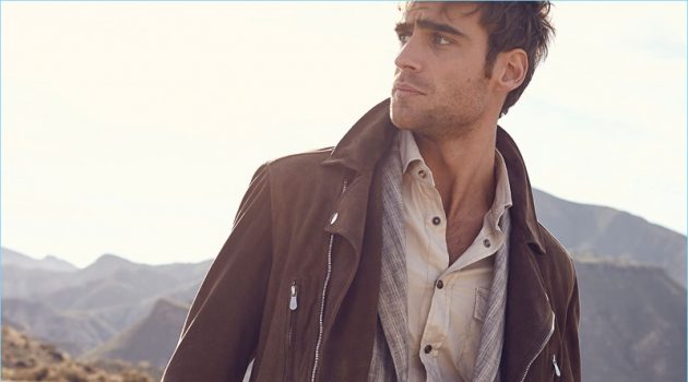 George Alsford Models Brunello Cucinelli Looks for Neiman Marcus Neiman Marcus makes a case for layering with a look from Brunello Cucinelli. Here, George Alsford dons the brand's suede moto jacket with a striped linen sport jacket. A western style shirt and white denim jeans complete George's look.
