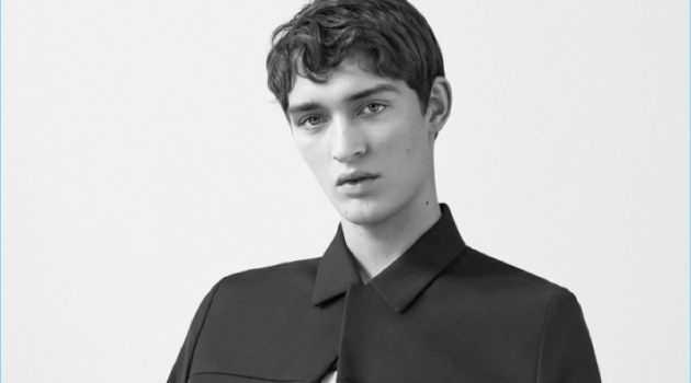 Otto Lotz Embraces Minimal Style with COS Spring '18 Essentials Otto Lotz wears a round-neck t-shirt, cotton-wool blend jacket, and slim-fit trousers with pleats by COS.