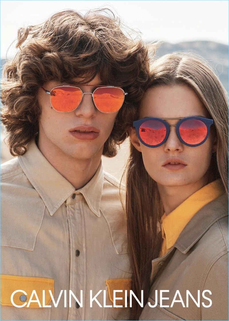 Models Fernando Albaladejo and Lulu Tenney rock sunglasses for Calvin Klein Jeans' spring-summer 2018 campaign.