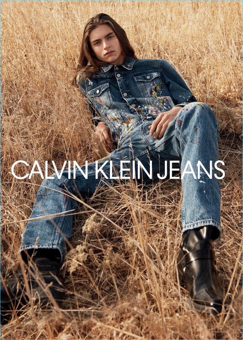 Posing in the field, Dylan Christensen stars in Calvin Klein Jeans' spring-summer 2018 campaign.