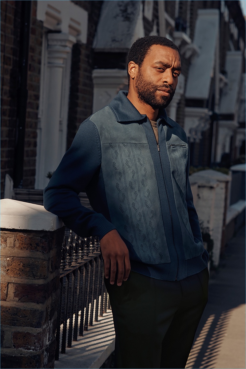 Connecting with Mr Porter, Chiwetel Ejiofor wears a Prada wool jacket with a Tom Ford t-shirt and Berluti trousers.