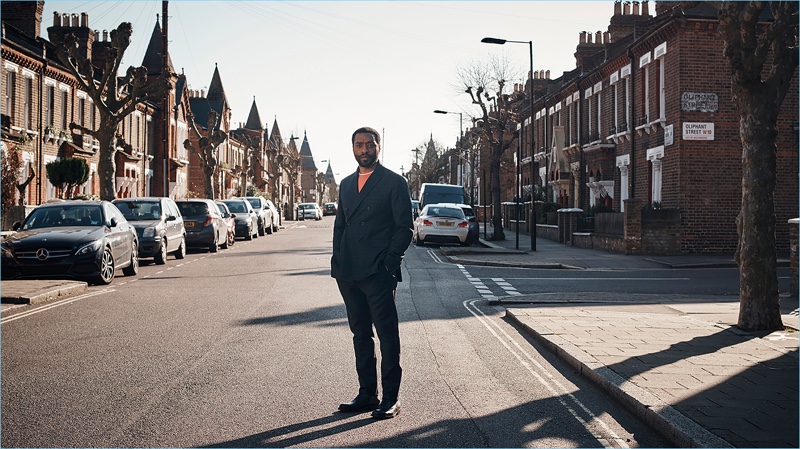 Chiwetel Ejiofor wears a Bottega Veneta double-breasted jacket and trousers with a Brunello Cucinelli t-shirt. He also dons Dries Van Noten leather boots.