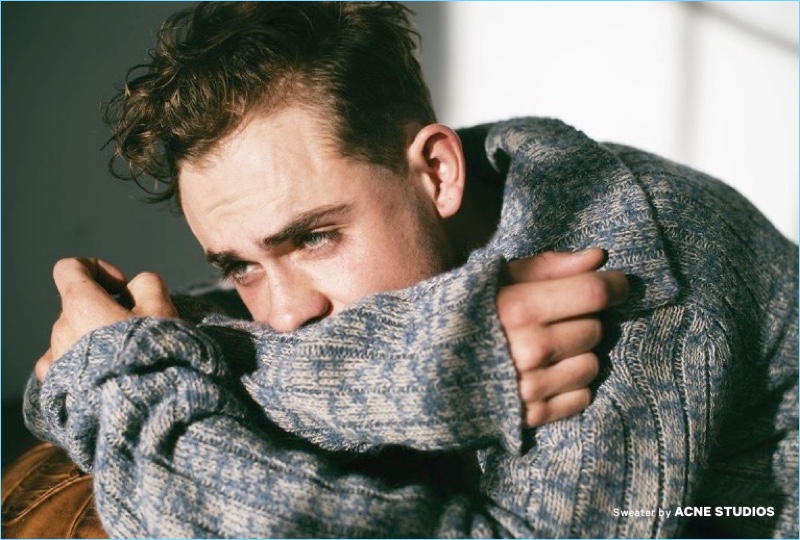 Embracing the oversized trend, Dacre Montgomery wears a sweater by Acne Studios.