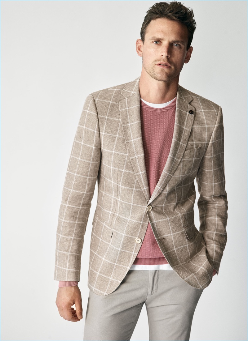 Showcasing smart men's fashions, Digel enlists the help of model Guy Robinson.