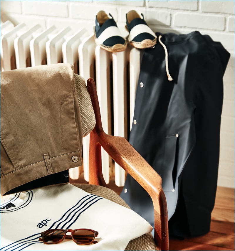 Naval Idea: Go nautical with Stutterheim's Stockholm raincoat. You can also try an A.P.C. pullover, Raen sunglasses, Obey pants, or Soludos stripe espadrilles.
