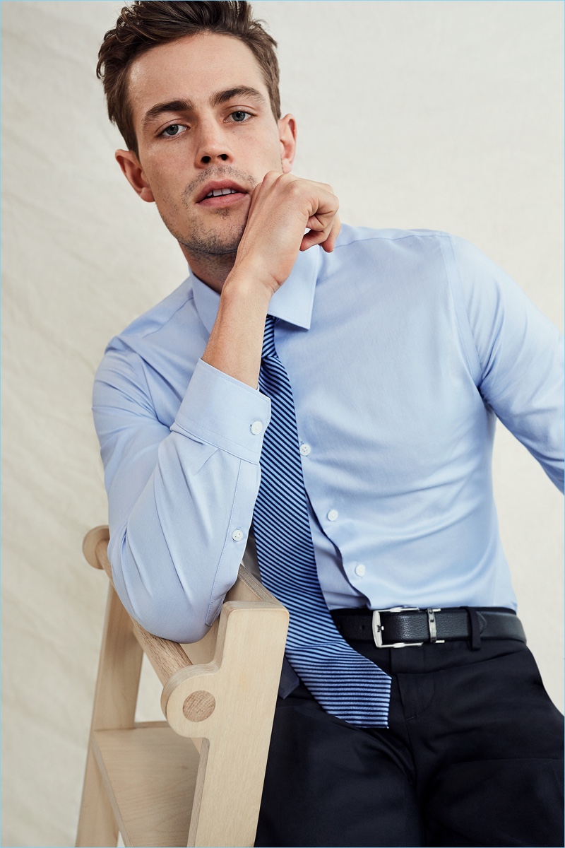 Tom Barker sports a smart shirt and tie from Express.