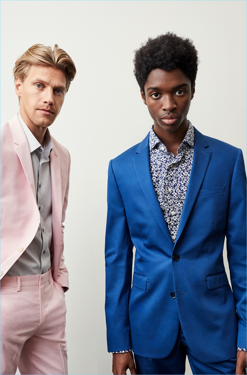 Models Daniel Lonnstrom and Alton Mason don striking suits by Express.