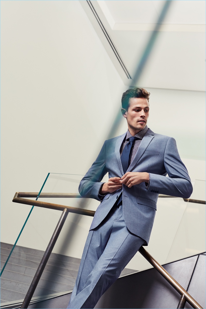 British model Tom Barker suits up for Express.