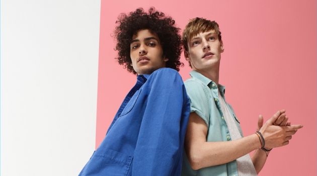 Gap Makes a Stylish Case for Colored Denim Left: Trè Samuels wears a blue shirt jacket and green jeans from Gap. Right: Roberto Sipos rocks a Gap short-sleeve oxford shirt and soft pink jeans.