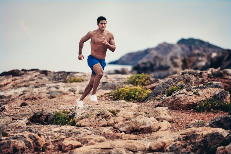 Going for a run, Jeremy Jauncey rocks Orlebar Brown's Bulldog Sport swim shorts in mazanine blue.